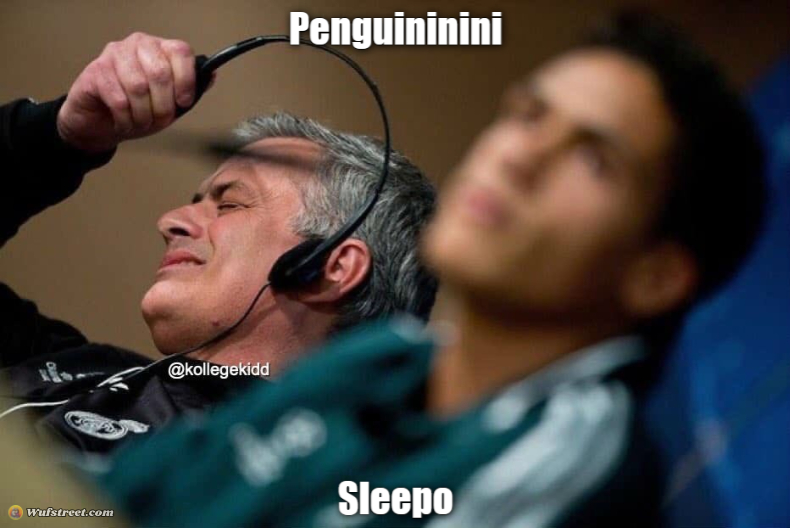 European football coach removing headphones